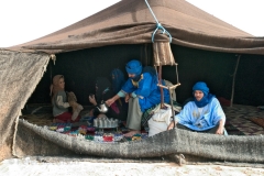 Berbers in their Nomadic tent in the Erg Cebbi Dunes sahara desert morocco